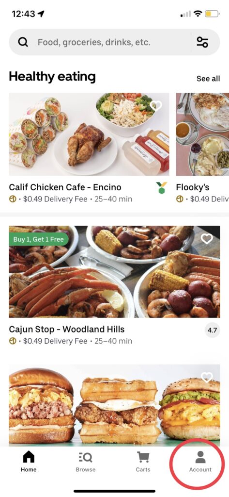 UberEats App Homepage with a red circle around the Account menu.